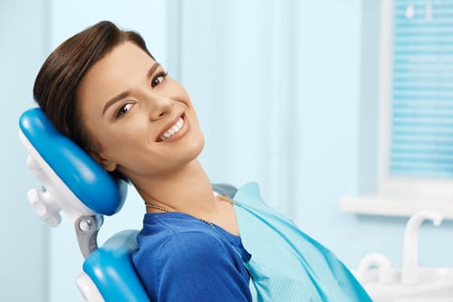 young female patient visiting dentist office-img-blog