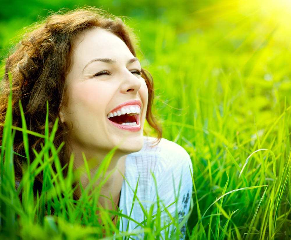 Young Woman Laughing Outside