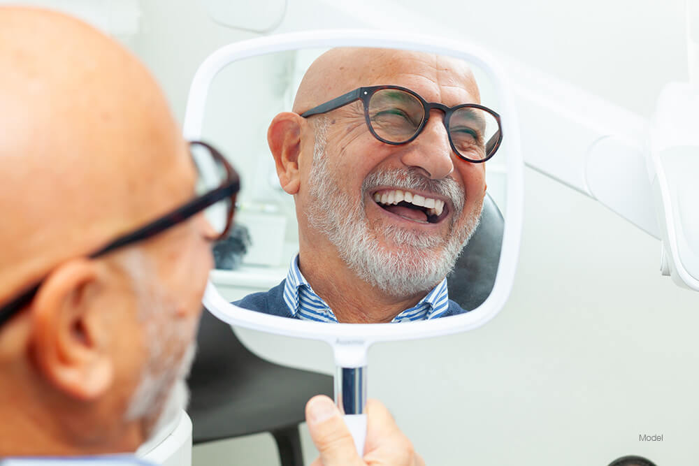 Man smiling in a mirror