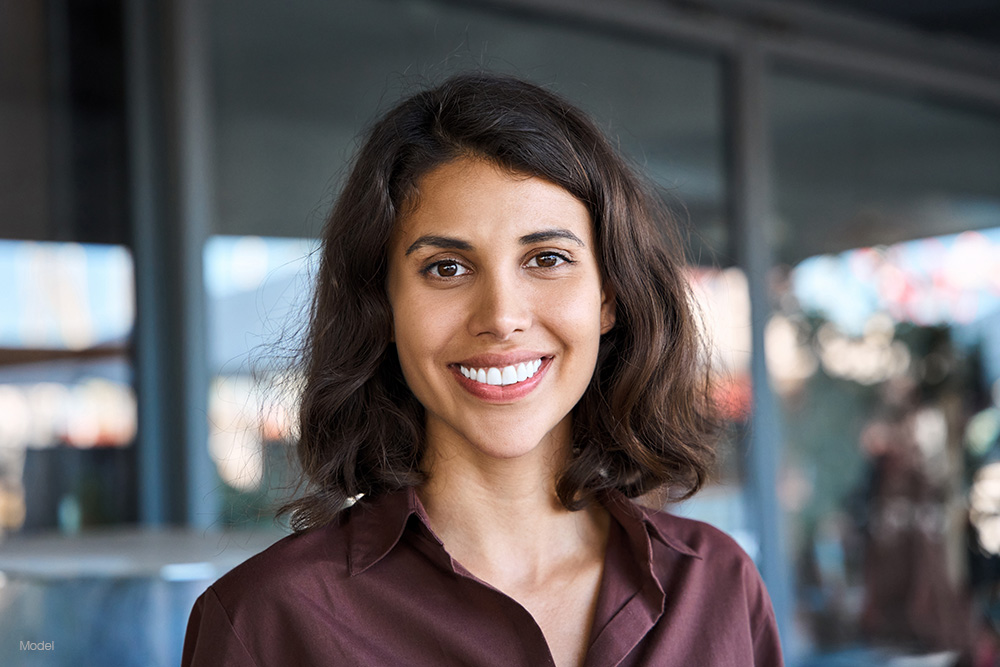 Mature woman with short hair smiling